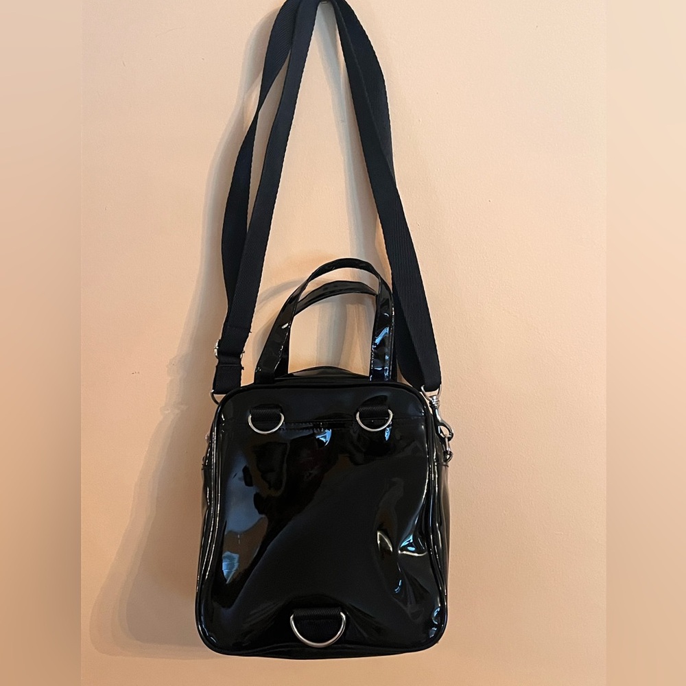 L.E.I. patent leather mini backpack or crossbody convertible bag, like new